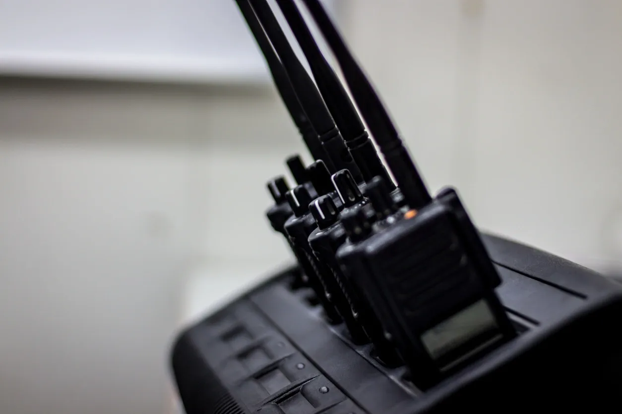 Professional two-way radios on charging dock